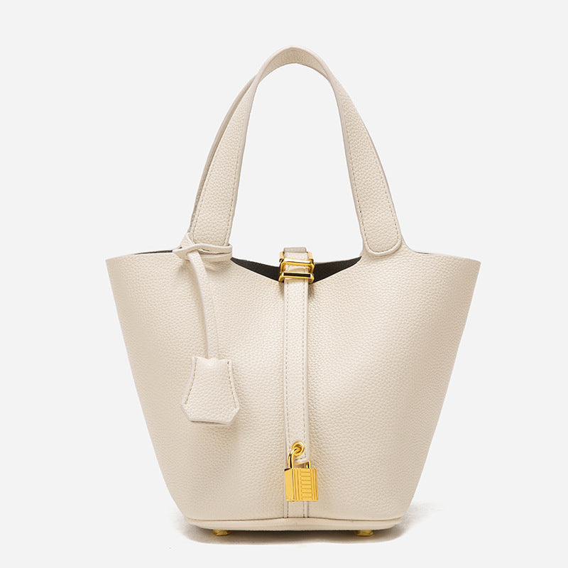 Beige Elegant Leather Handbag with Gold Lock Detail